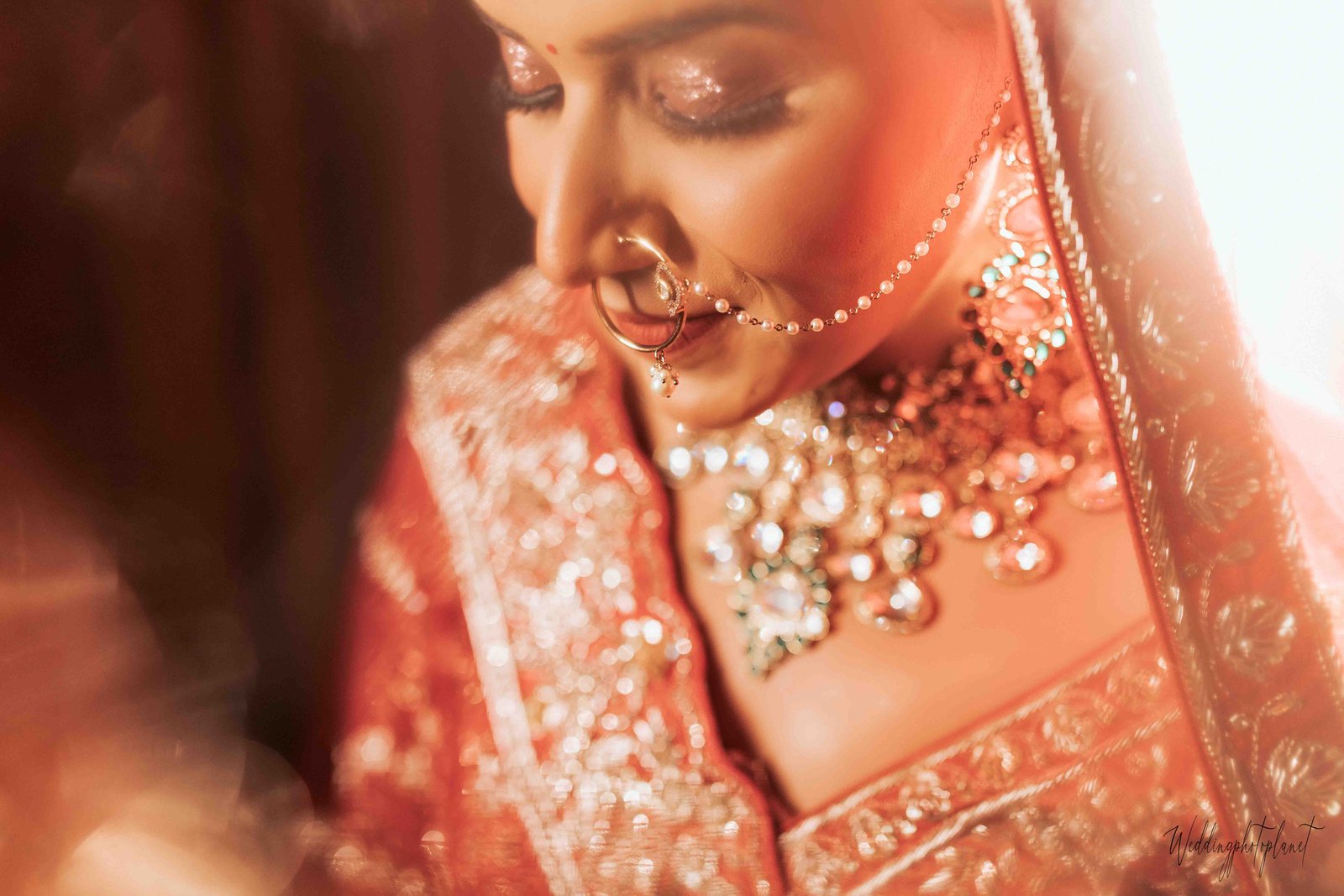 Elegant bridal portrait in red saree